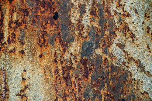 texture of rusty iron, cracked paint on an old metallic surface, sheet of rusty metal with cracked and flaky paint, corrosion, decay metal background, decay steel, decay
