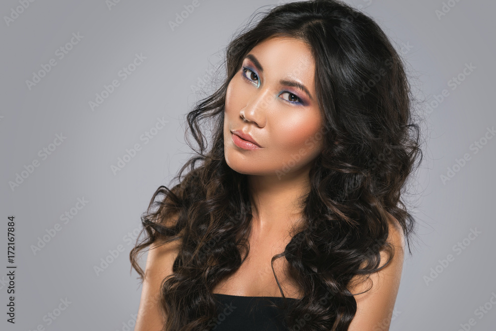 Young asian woman with a beautiful curly hair Young asian woman with a beautiful curly hair