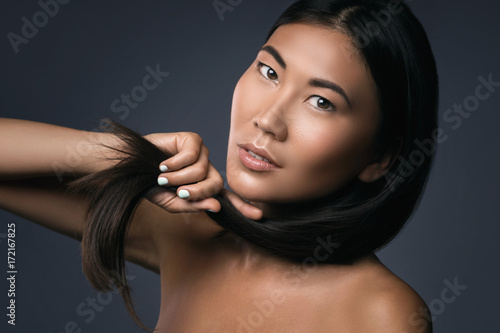 Young asian woman with straight black hair