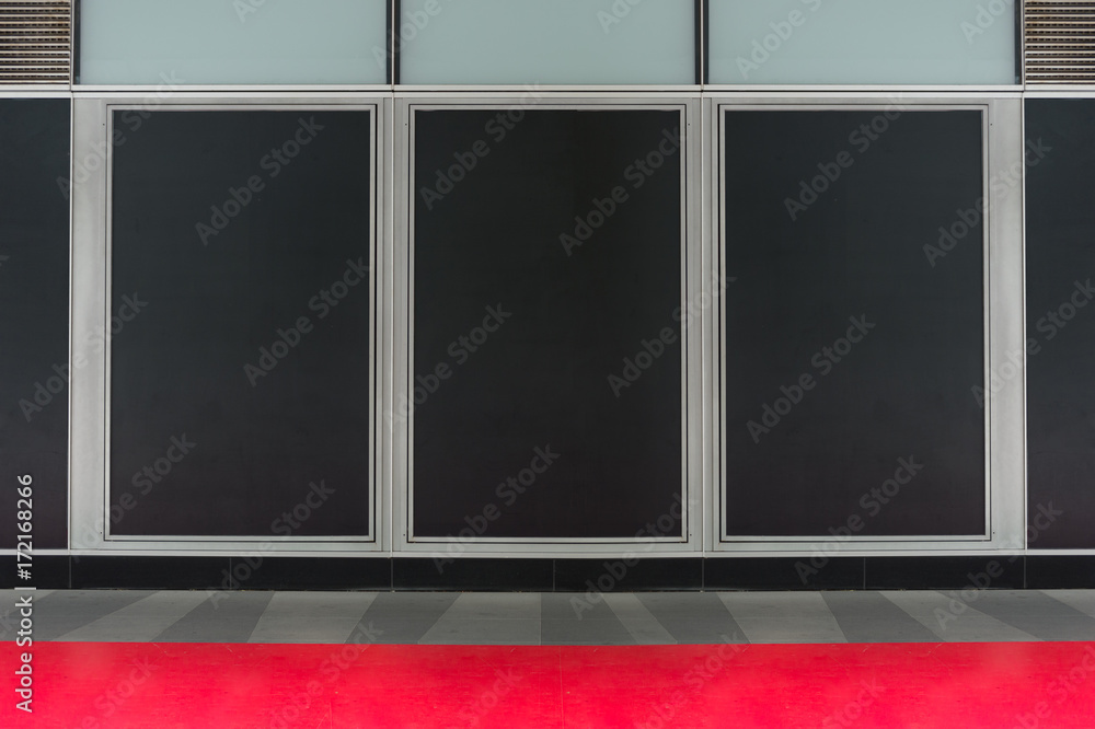 Fototapeta premium Large blank billboard on a street wall, banners with room to add your own text