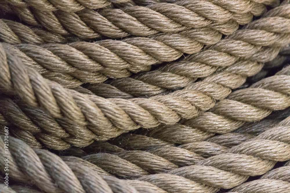 Close-up photo of sailing rope hanging loosely of a spool Close-up photo of sailing rope hanging loosely of a spool