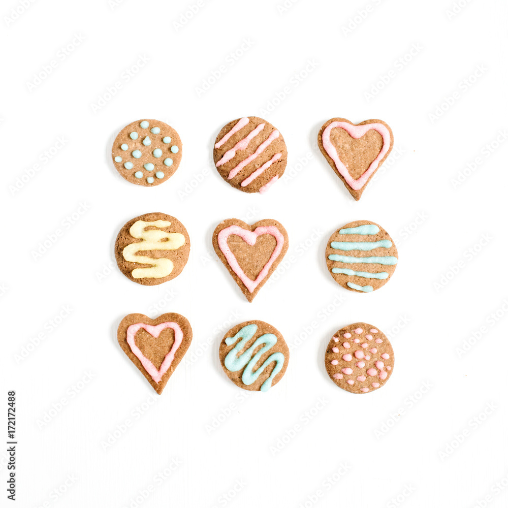 Colorful hand made cookies on white background. Flat lay, top view. Colorful hand made cookies on white background. Flat lay, top view.