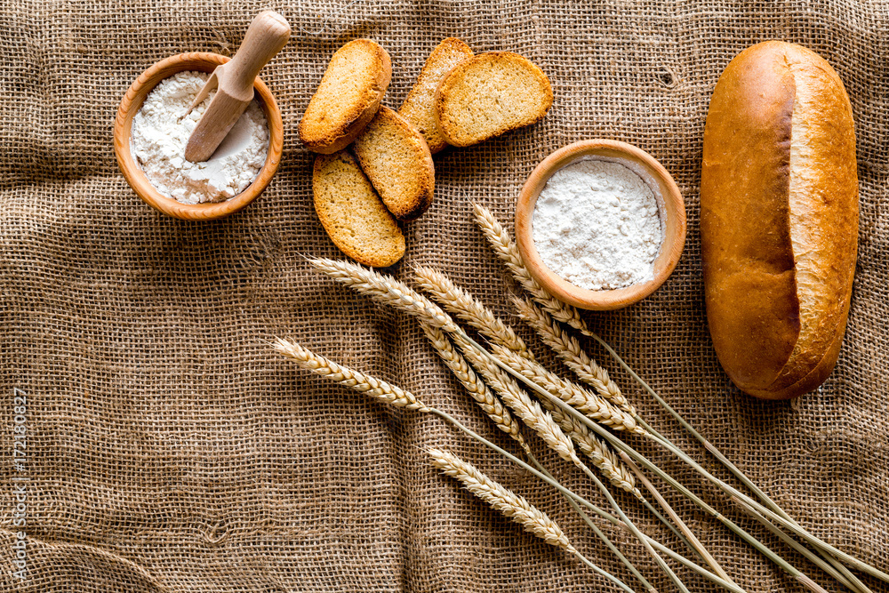 baking bread with wheat flour and ears on table rystic background top view mockup baking bread with wheat flour and ears on table rystic background top view mockup