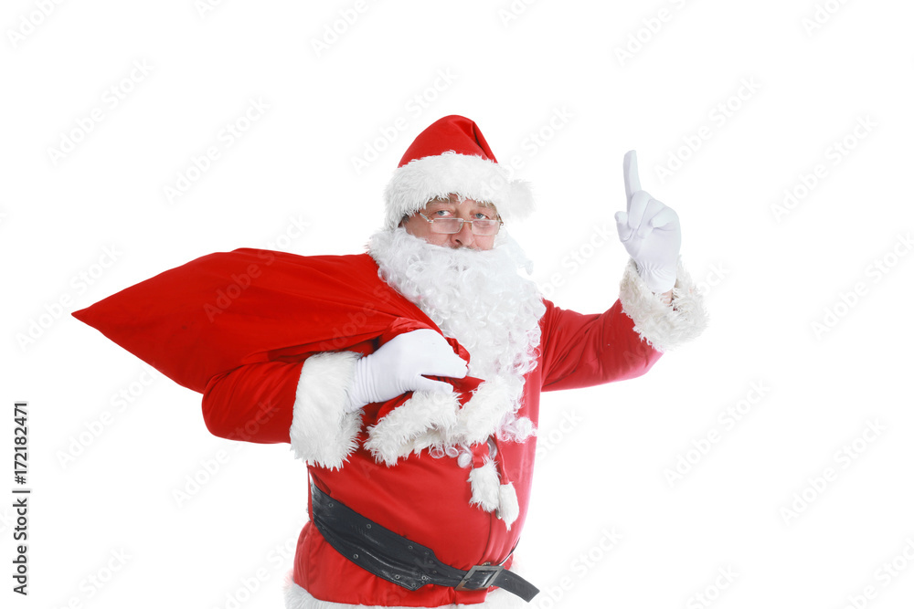 Real Santa Claus carrying big bag full of gifts, isolated on white background Real Santa Claus carrying big bag full of gifts, isolated on white background
