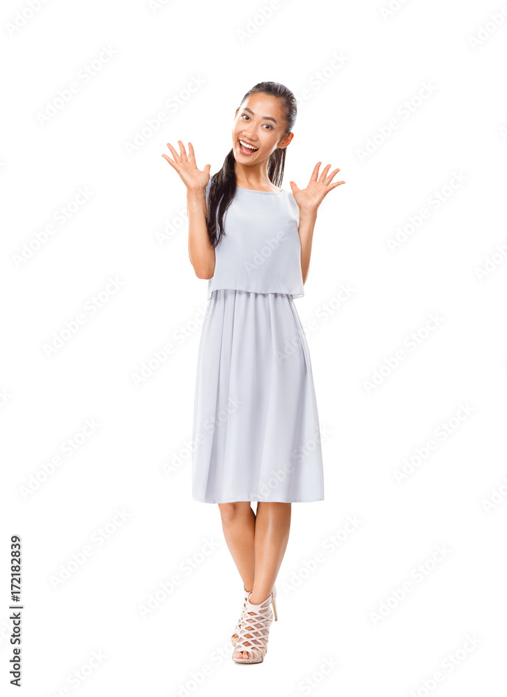 Joyful Asian young woman wearing dress and high-heeled shoes Joyful Asian young woman wearing dress and high-heeled shoes