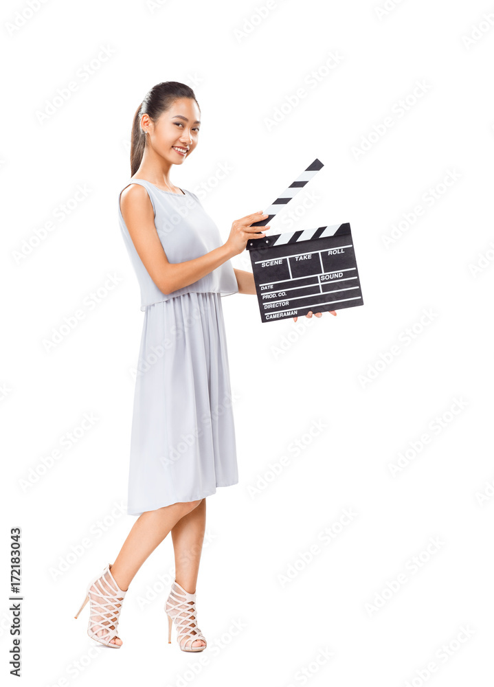 Beautiful young Asian woman holding cinema clapper board isolated Beautiful young Asian woman holding cinema clapper board isolated