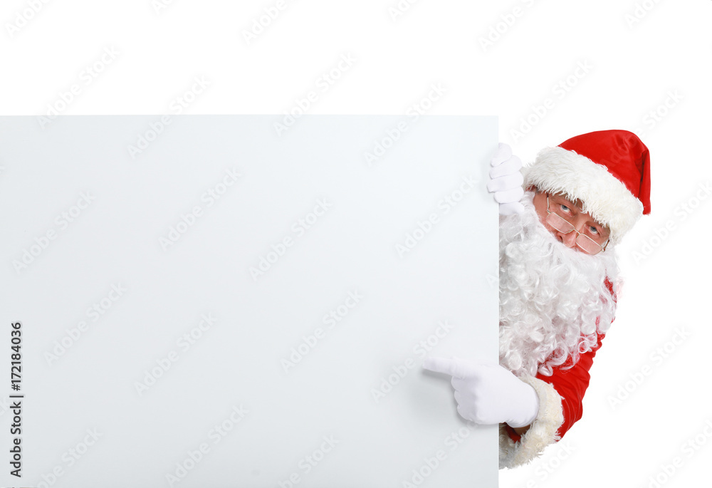 Happy Santa Claus looking out from behind the blank sign isolated on white background Happy Santa Claus looking out from behind the blank sign isolated on white background