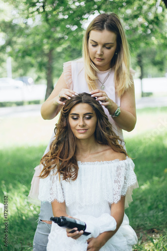 Wallpaper Mural Hairdressing, Master create beautiful hairstyle for young woman. Torontodigital.ca