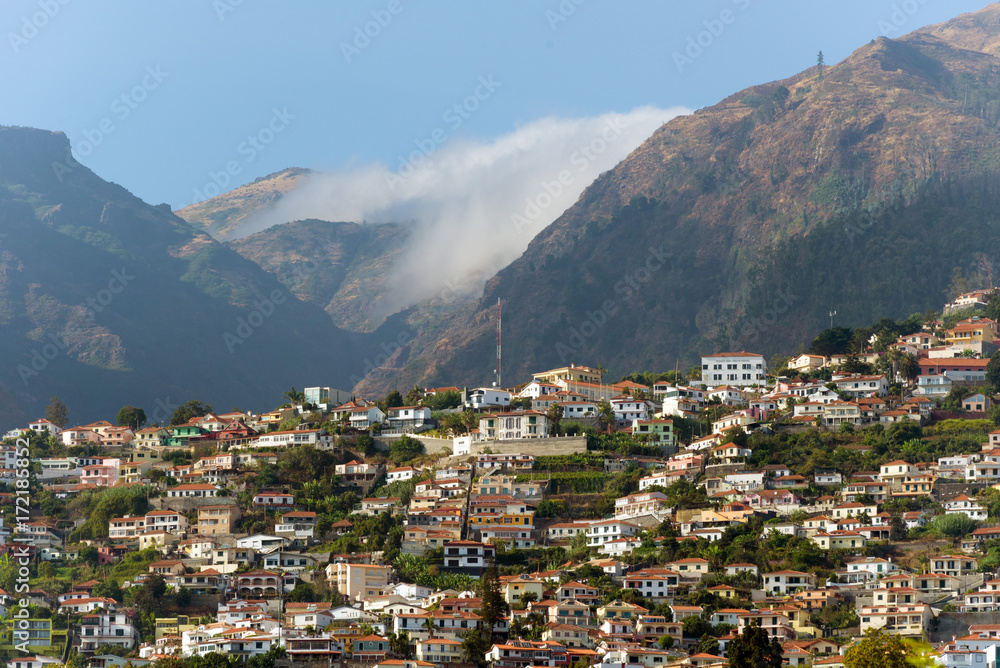 houses on the steep slopes of the city of Funchal, capital of the Portuguese island of Madeira