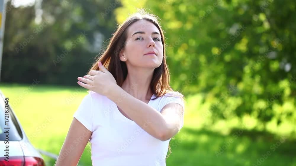 Happy Brunette. Beautiful young woman in white t-shirt Happy Brunette. Beautiful young woman in white t-shirt