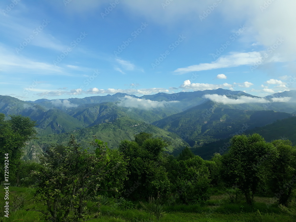 Fototapeta premium A view of mountains and sky in outskirts of Himalayas.