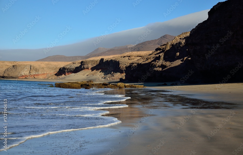 Beach in low tide, Las coloradas, Fuerteventura, Canary islands
