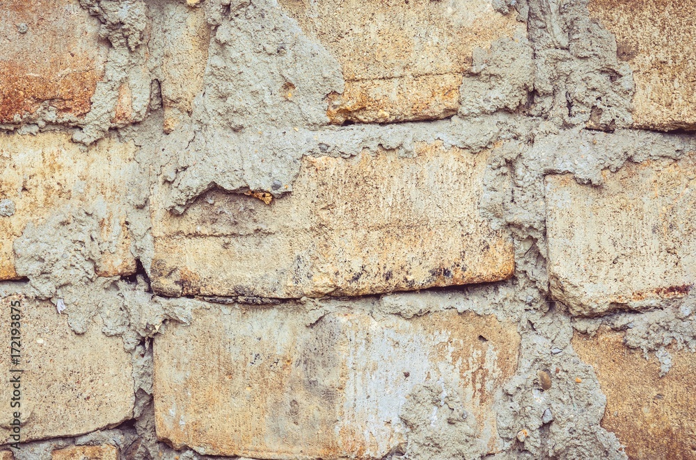 Old stone background. Texture of stone on the wall. Old stone background. Texture of stone on the wall.