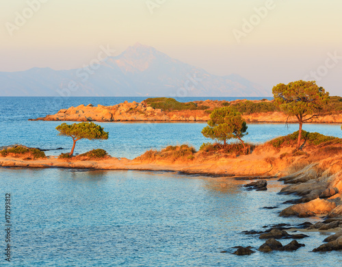 Sunset Aegean sea coast (Chalkidiki, Greece). photo