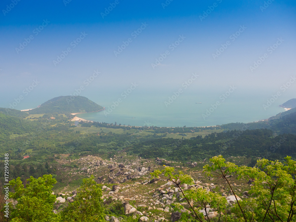 Beautiful view of the coastline of Danang, Vietnam, in a sunrise from the top of a mountain