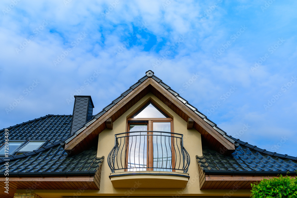 Balcony and roof with tiles of single family house