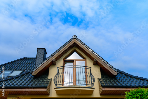 Balcony and roof with tiles of single family house