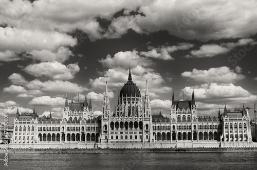 Photography Hungarian Parliament on the embankment of Danube river in Budapest, Hungary