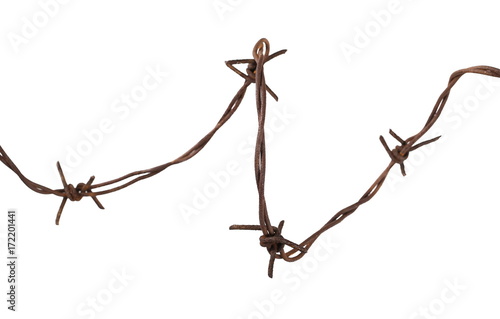 Old security barbed wire fence isolated on white background