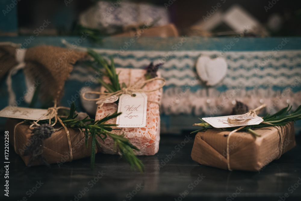 Packages shabby chic with avana paper and rosemary twigs with ''with love''  labels Stock Photo | Adobe Stock
