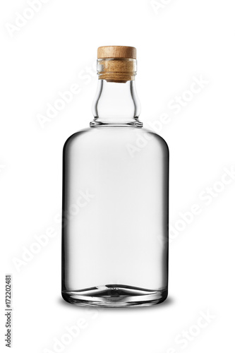 Glass bottle of white alcoholic beverage with cork without label photo