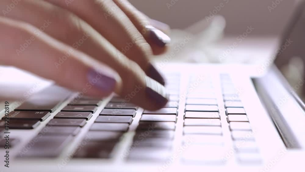 Hands typing on computer keyboard Hands typing on computer keyboard