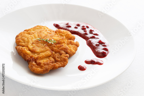 turkey schnitzel with sauce based on red wine and cowberry