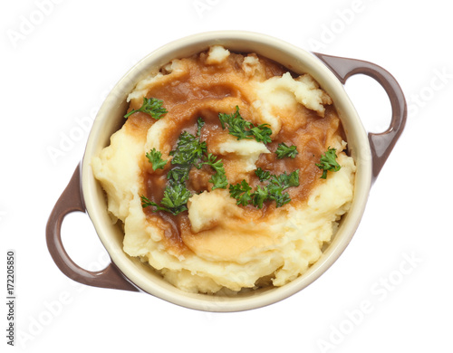 Mashed potatoes in pot, isolated on white