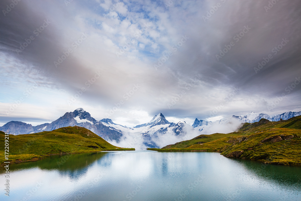 Great view of Mt. Schreckhorn and Wetterhorn above Bachalpsee lake. Location Swiss alp, Bernese Oberland, Grindelwald, Europe.