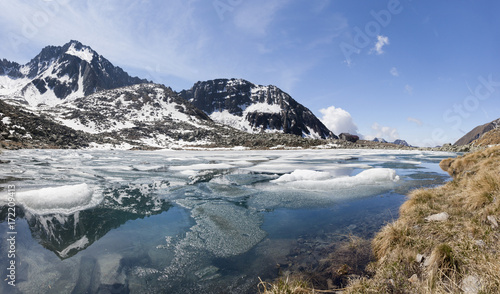 Panoramic of Lago Rotondo during summer thaw Val Malga Adamello Regional Park province of Brescia Lombardy Italy Europe