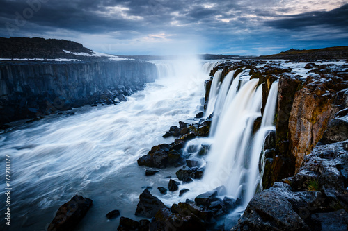 Rapid flow of water powerful Selfoss cascade. Popular tourist attraction. © Leonid Tit