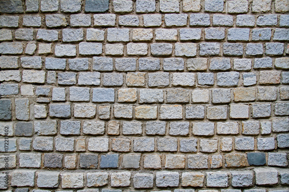 Stacked stone wall as background, texture
