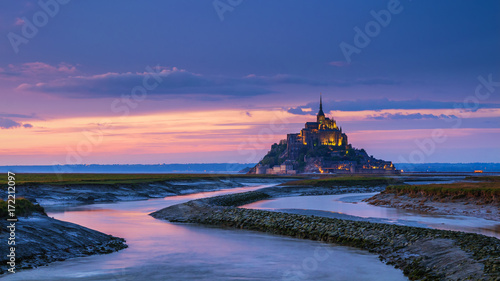 Panoramic view of famous Le Mont Saint-Michel tidal island at sunset, Normandy, northern France photo