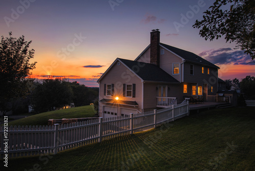 Colonial house sunset