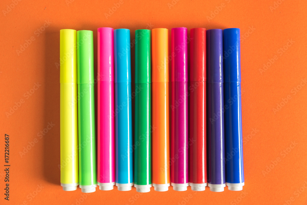 Obraz premium colorful marker on orange background