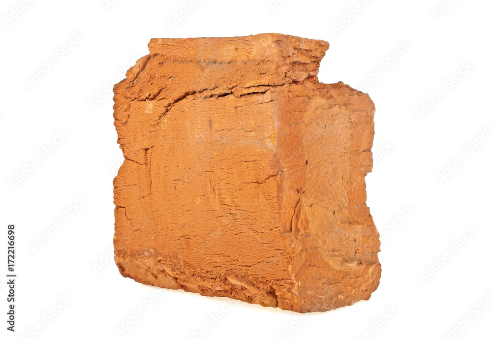 Half old red brick on white background