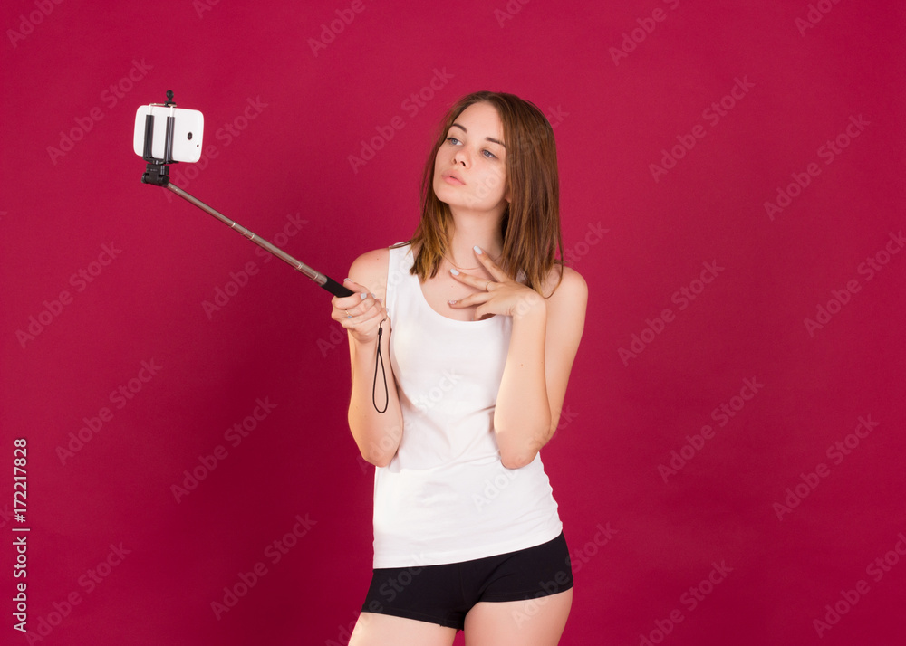 Young pretty girl, selfie, studio  