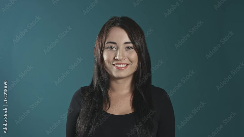 Beautiful young woman looking straight. Beautiful young woman looking straight.