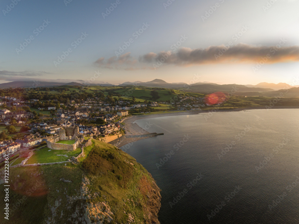 Criccieth Castle, town, seafront and coast aerial view, Wales, UK.