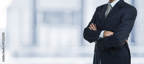 Businessman in front of a bright copy-space