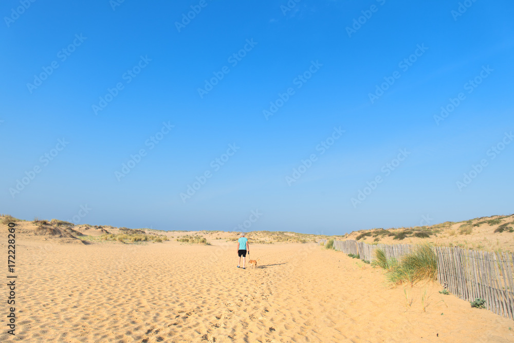 Man walking at the coast