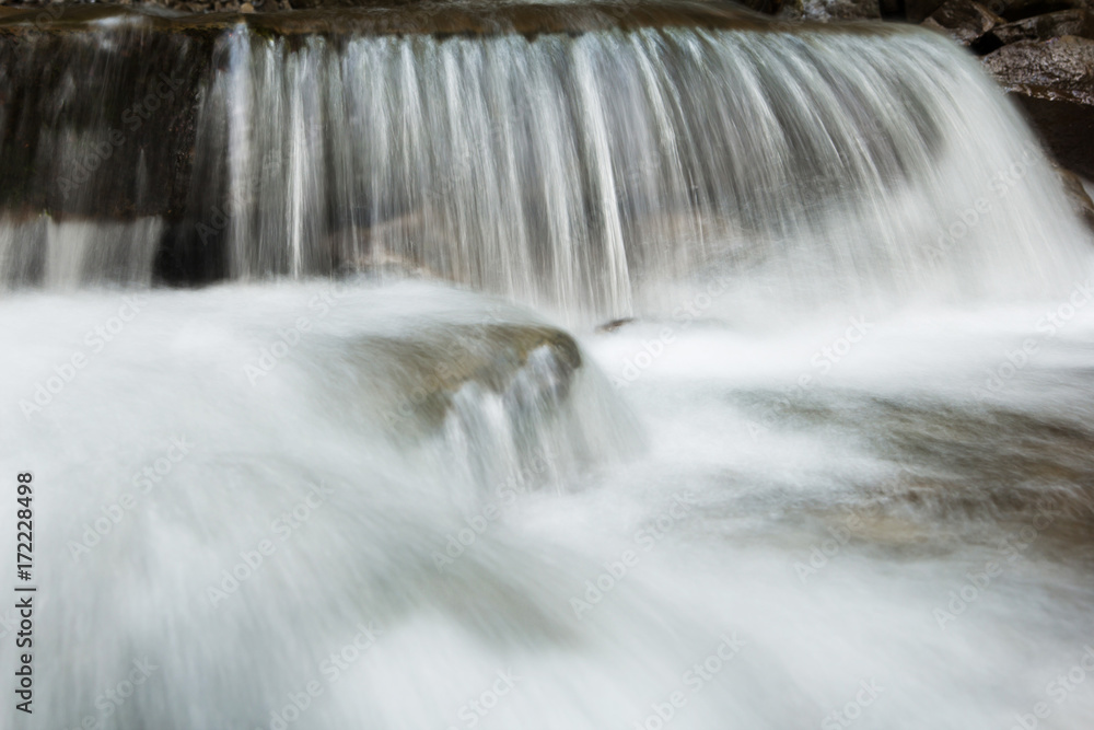 Mountain waterfall landscape. Close-up Mountain waterfall landscape. Close-up