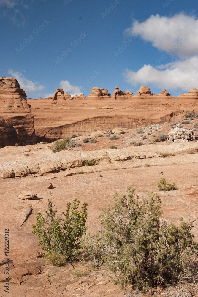 View of the iconic Delicate Arch in Moab Utah slick rock strata highlights the beauty of the American Southwest View of the iconic Delicate Arch in Moab Utah slick rock strata highlights the beauty of the American Southwest