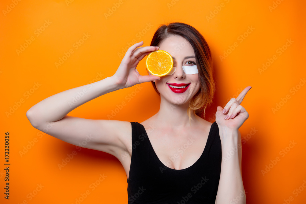 Woman using eye patch for her eyes Woman using eye patch for her eyes