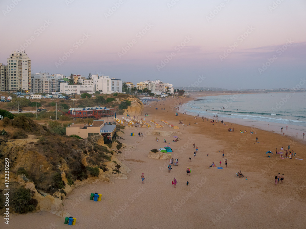 Armacao de Pera beach at the sunset - Portugal Armacao de Pera beach at the sunset - Portugal