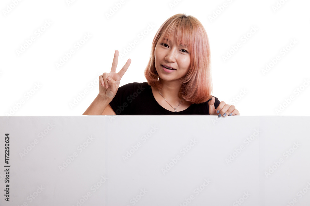Young Asian woman show victory sign with blank sign. Young Asian woman show victory sign with blank sign.