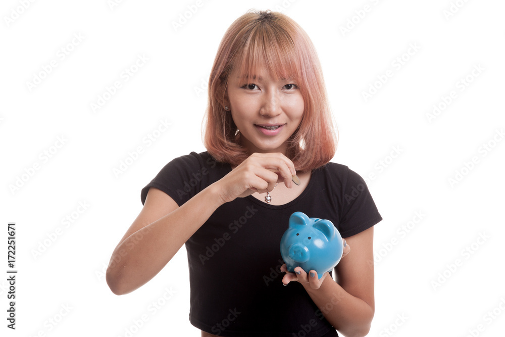 Asian woman with coin and pig coin bank. Asian woman with coin and pig coin bank.