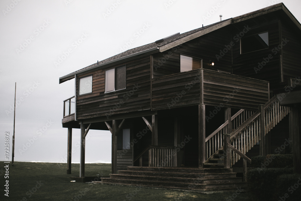 beach house at the coast on gloomy day beach house at the coast on gloomy day
