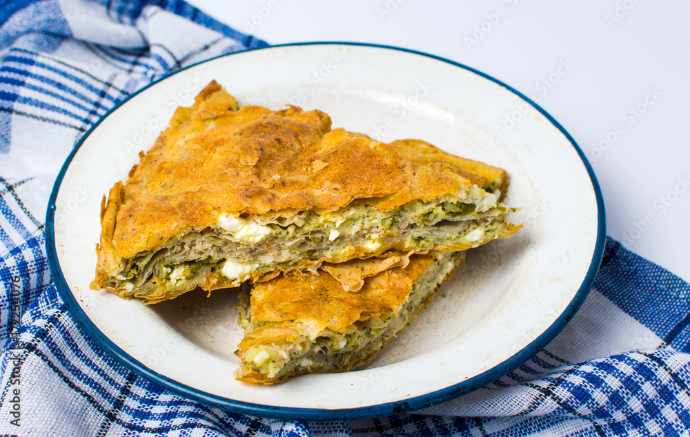 Homemade pie with cheese and spinach Homemade pie with cheese and spinach
