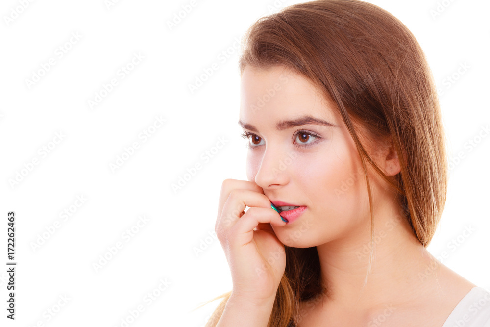 Teenage woman looking worried, thinking about something Teenage woman looking worried, thinking about something